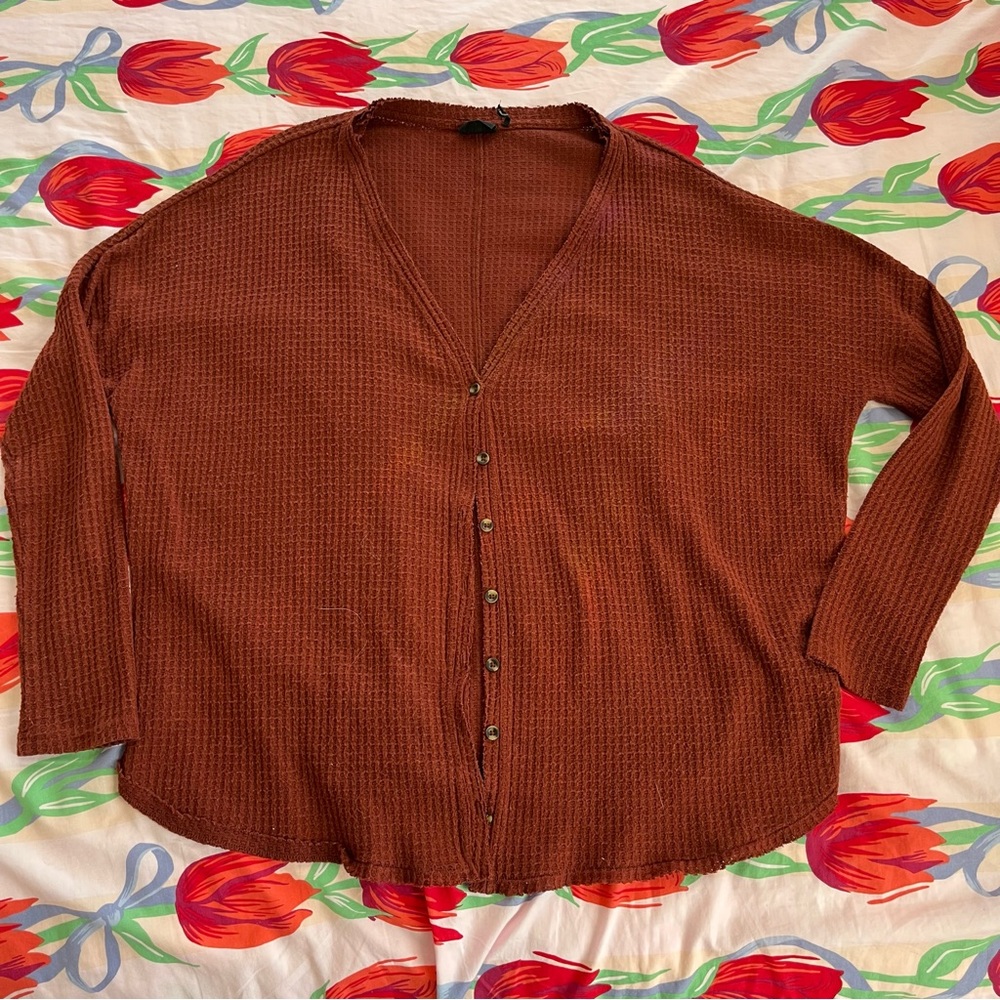 out from under cardigan